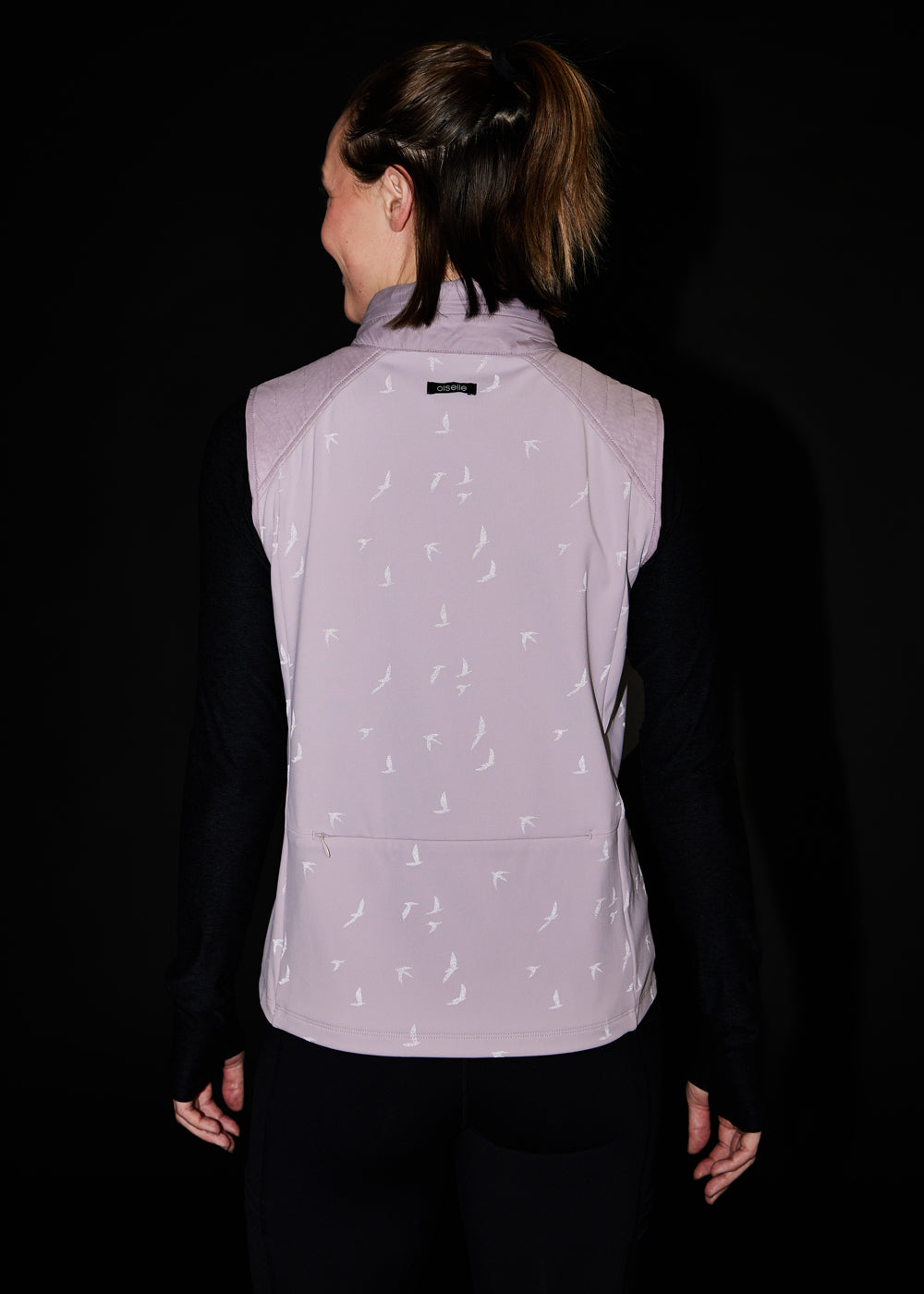 Firecracker Insulated Running Vest in Lavender purple, reflective back view