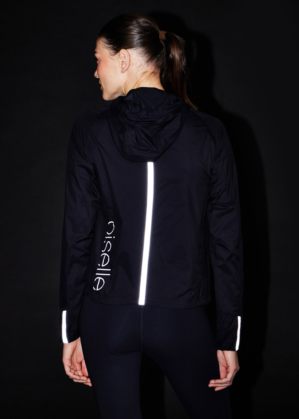 Vim Packable Running Jacket in Black, reflective accents on back