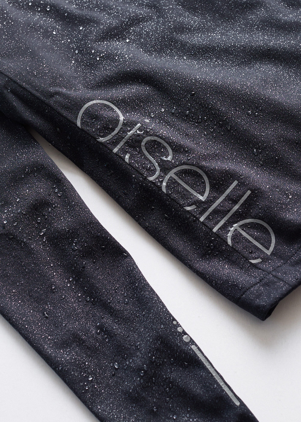 Say Anything Waterproof Running Jacket in Black, waterproof detail view