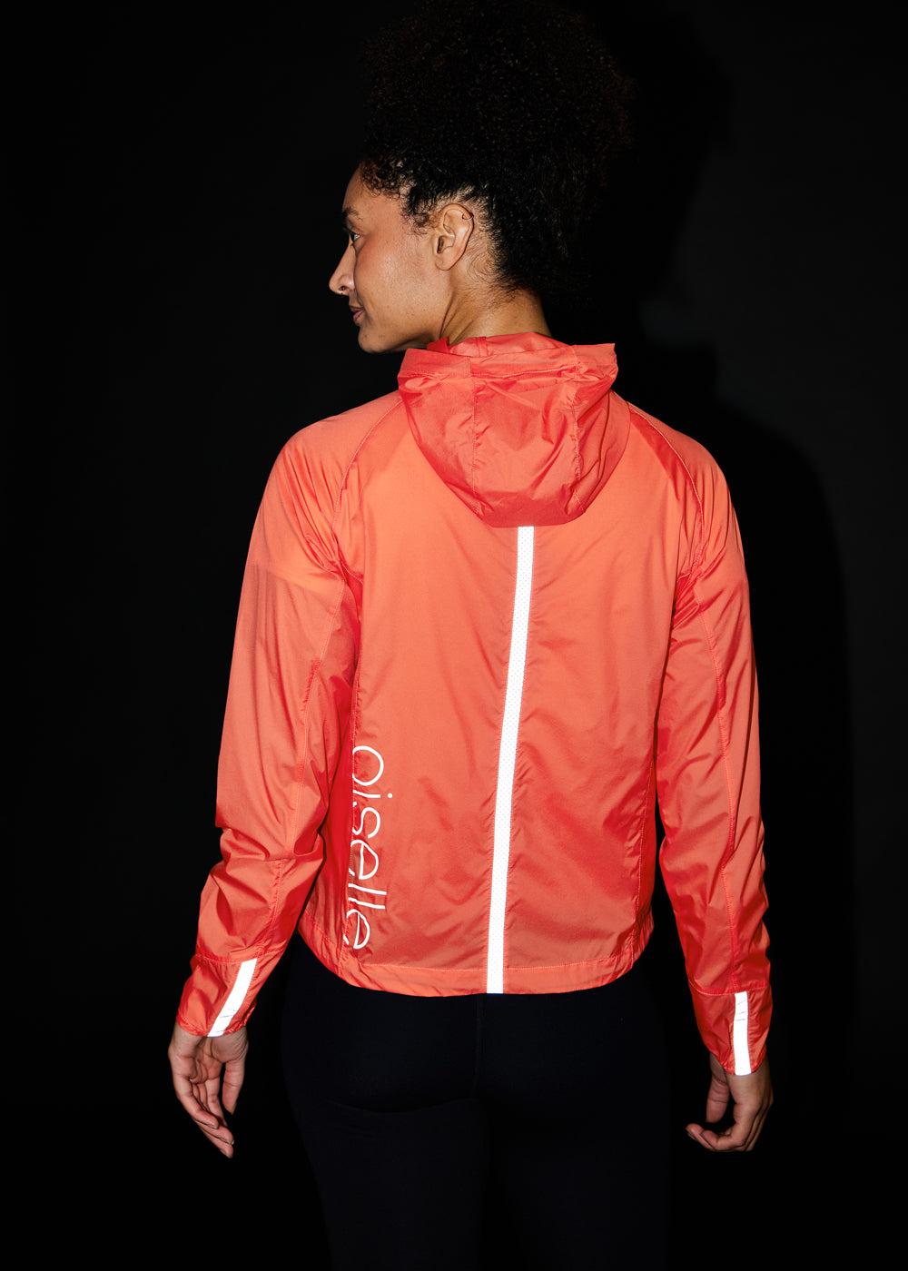 Vim Packable Running Jacket in Alpenglow, rear view with reflective details