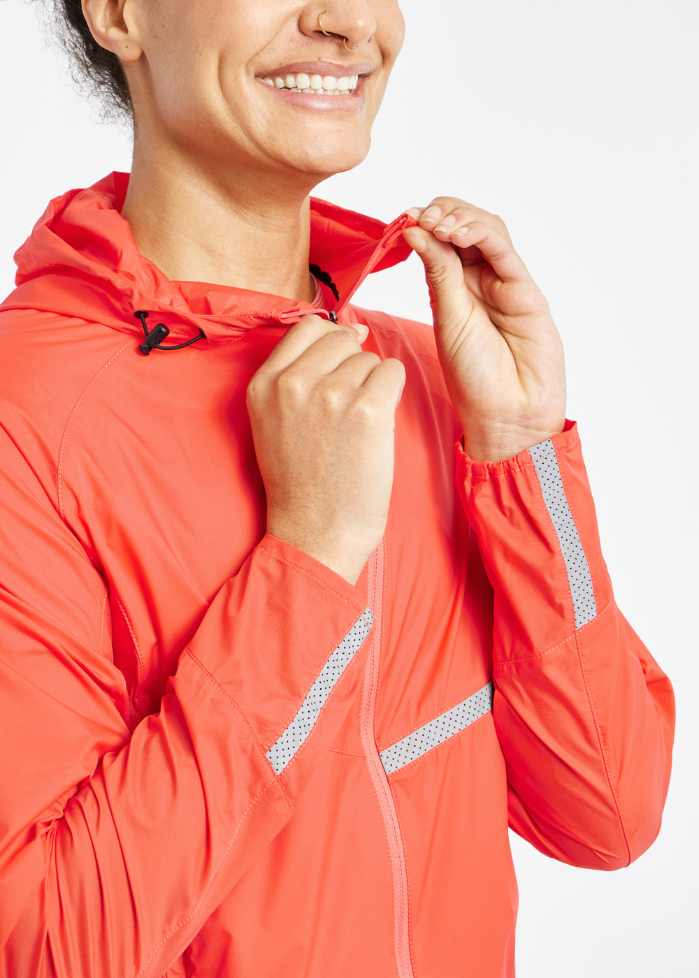 Vim Packable Running Jacket in Alpenglow, front detail view